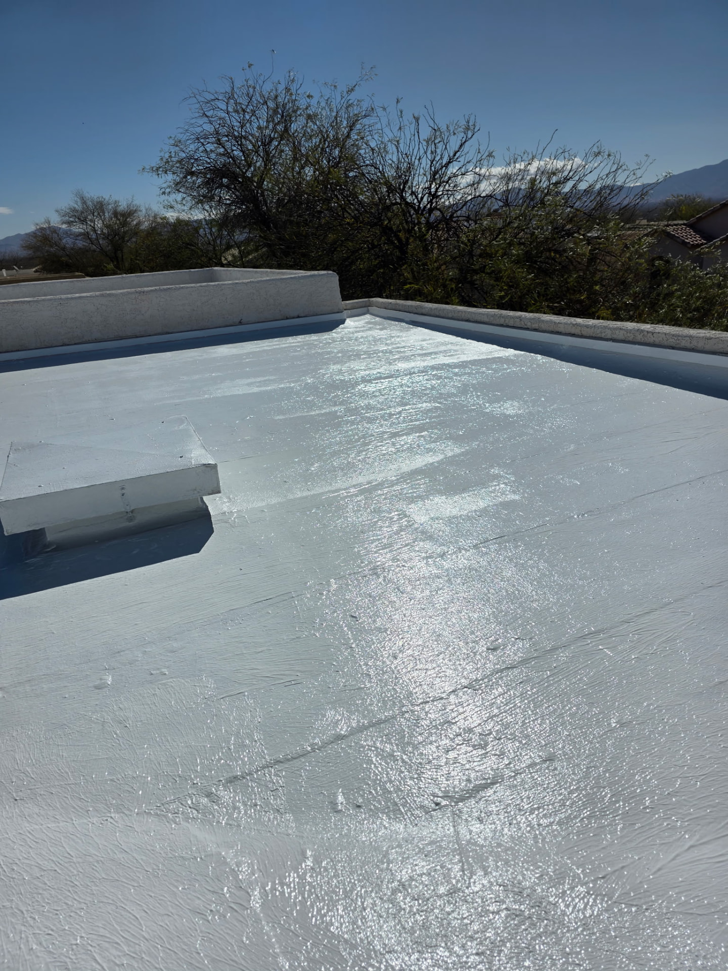 Finished Flat Roof, Parapet, Flat Roof roofing project by Rob's Roofing & Remodeling