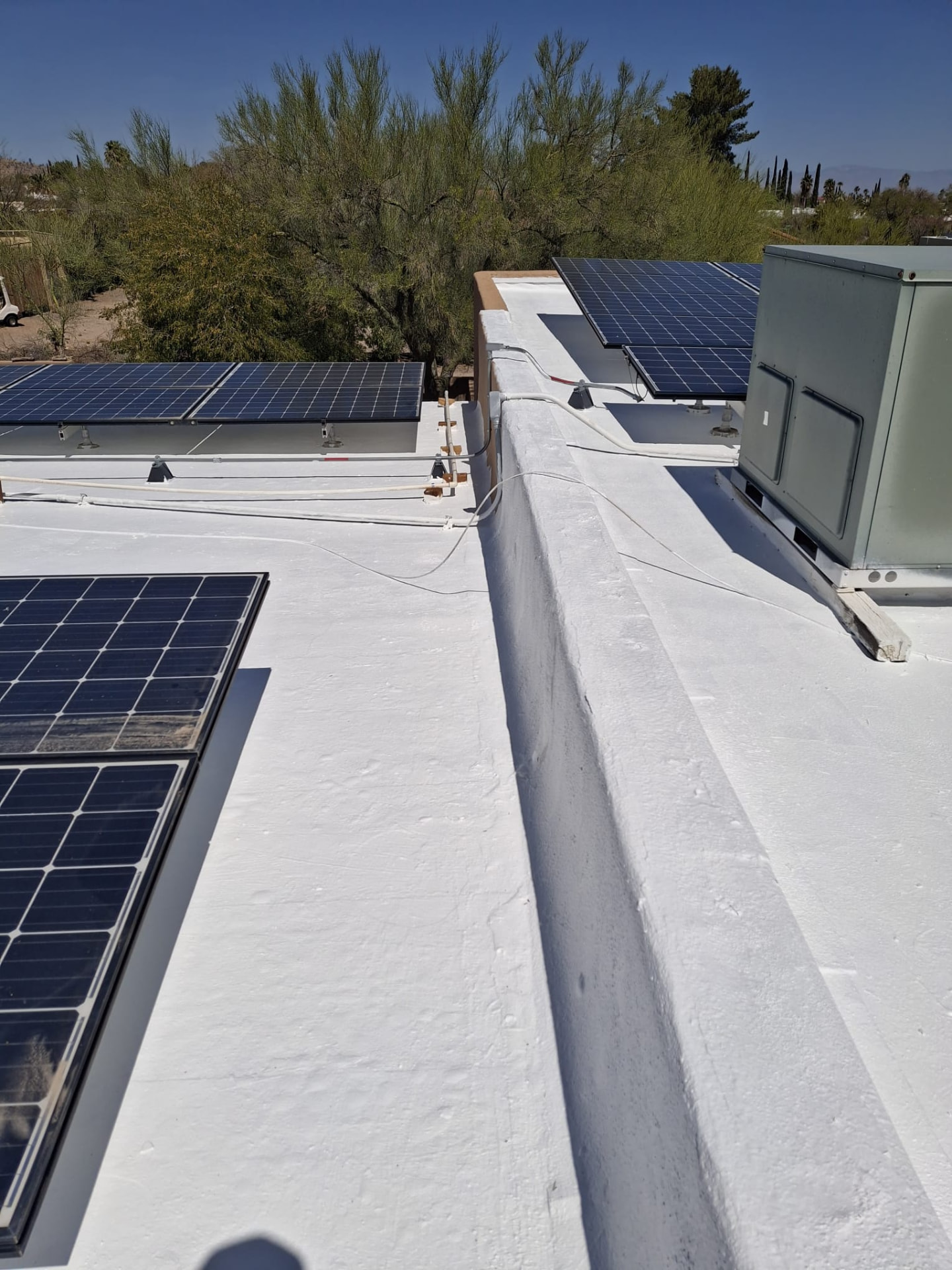 Commercial Coating With Solar, Flat Roof roofing project by Rob's Roofing & Remodeling