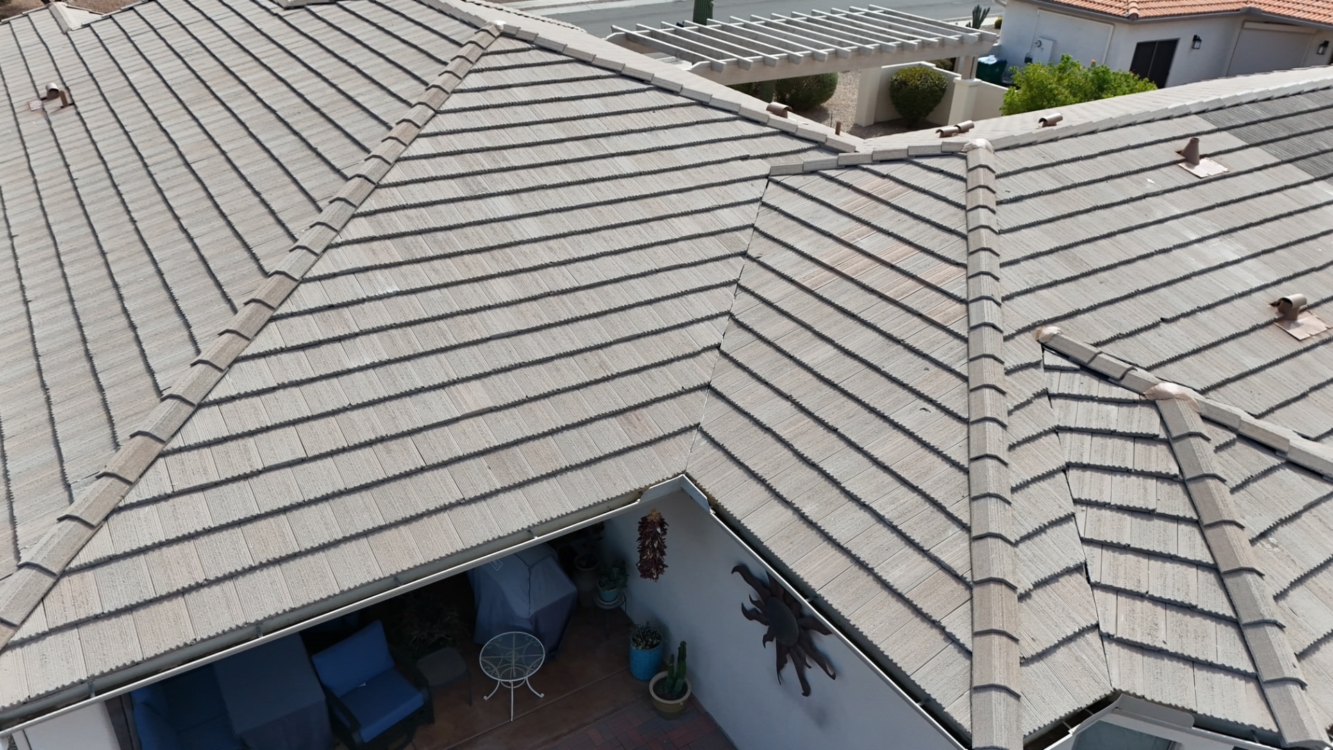 Light Grey Tile, Patio Tie-In, Tile roofing project by Rob's Roofing & Remodeling