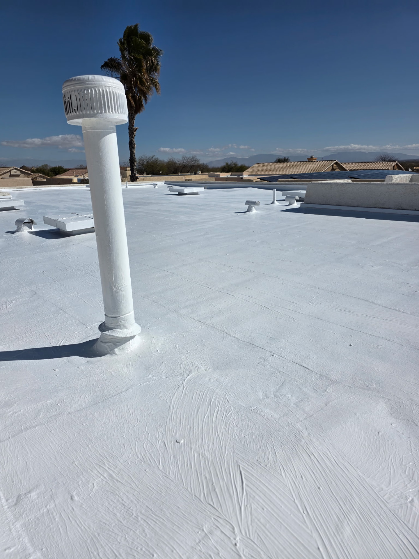 Finished Flat Roof, Vent Detail, Flat Roof roofing project by Rob's Roofing & Remodeling