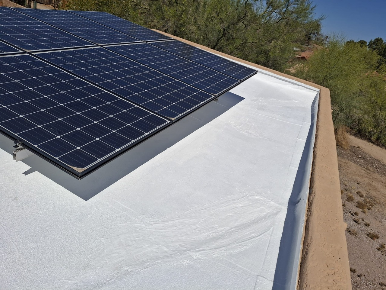 New Cool-Roof Coating With Solar, Flat Roof roofing project by Rob's Roofing & Remodeling